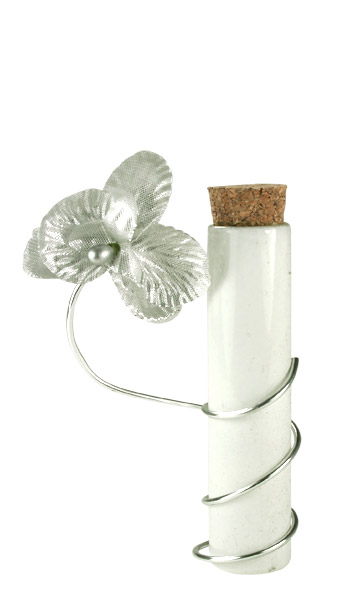 Eprouvette blanche contenant dragées orchidée